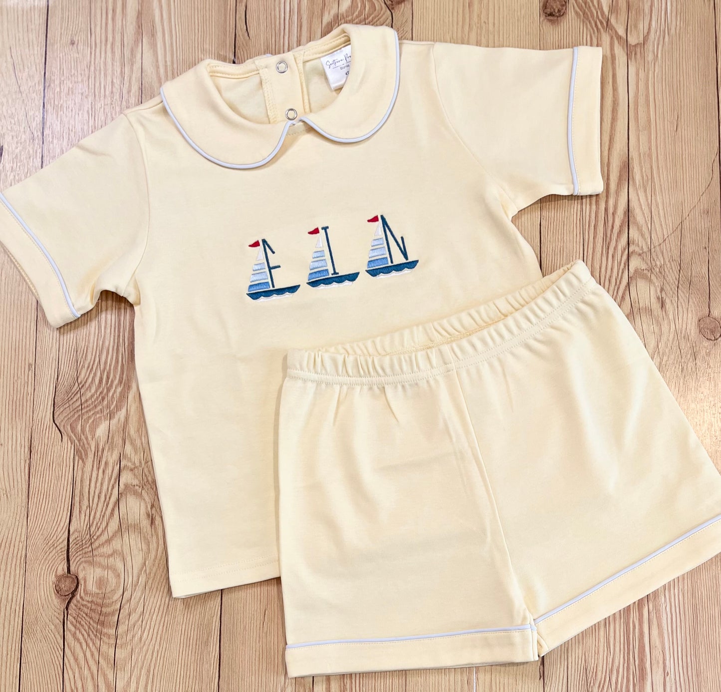 Piped shorts set with boat name